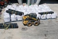 This Skid Steer has a lot of pallets to move.