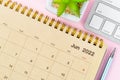 June 2021 desk calendar with keyboard computer on pink Royalty Free Stock Photo