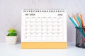 June 2024 Desk Calendar with wooden pencils