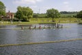 An eight man skulls crew in training on the river at Henley-on-Thames in Oxfordshire