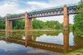 A June Evening with wonderful reflections at Cooks Pond Viaduct Sussex England