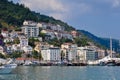 June 24, 2019 Fethiye, Turkey - Cascaded houses on a mountain in a bay