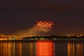 Fireworks over the evening city. View from the other side of the river. Cheboksary. Russia Royalty Free Stock Photo