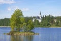 June landscape with Lutheran church. Ruokolahti, Finland