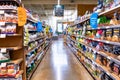 June 21, 2019 Los Altos / CA / USA - View of an aisle in a Whole Foods store, Amazon Prime Member offers visible on the shelves; Royalty Free Stock Photo