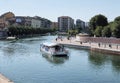 2022 JUNE Milan ITA - touristic boat at Milan city navigli Darsena waterway