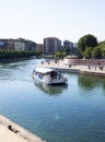 2022 JUNE Milan ITA - touristic boat at Milan city navigli Darsena waterway