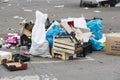 Garbage remains on the street at the site of the street market in the city of Milan.