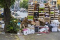 Garbage remains on the street at the site of the street market in the city of Milan.