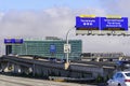 June 30, 2019 Millbrae / CA / USA - San Francisco International Airport SFO signs guiding travelers to the correct terminal;