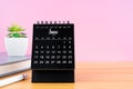 June Mini desk calendar for 2024 year on worktable with pink background Royalty Free Stock Photo