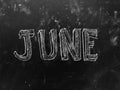 June Month Handwritten on Blackboard