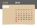 June 2019 - Monthly calendar on brown paper and wood background with area for note.