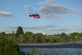 2021 June 4 Moscow region Podolsk - Helicopter refill bucket in lake for fire fighter Royalty Free Stock Photo