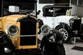 ÃÂ¾ view of Peugeot 5CV yellow 1925 and Fiat 509 Spider white 1927. Classical retro cars of 1920s.