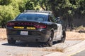 June 14, 2020 Mountain View / CA / USA - Highway Patrol vehicle parked on the left side of a freeway entrance; The California