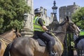 Mounted Police Officers on crowd control duty on the streets outside Royal Windsor Castle an official Royal Residence in Berkshire