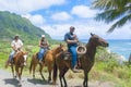 June 2012 oahu : these tourists are discovering hawaii oahu on horseback northshore Royalty Free Stock Photo