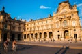 Tourist and Historic French building at Louvre museum