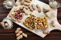 June party food top view. Candies and peanuts on the cutting board