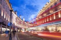 2016 June 16 Popular tourist Regent street with flags union jack in night lights Royalty Free Stock Photo