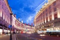 2016 June 16 Popular tourist Regent street with flags union jack in night lights Royalty Free Stock Photo