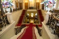 June 24, 2023 Russia, St. Petersburg, Nicholas Palace, staircase with a red carpet