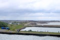 June 2 2022 - RÃÂ¸dby, Denmark: Cranes and excavators working at a new port facility for the Fehmarnbelt Tunnel Link project that Royalty Free Stock Photo