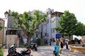 June 02 2023 - Saint-Florent, Corsica, France: people in the inner city with coloured houses