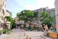 June 02 2023 - Saint-Florent, Corsica, France: people in the inner city with coloured houses