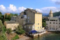 June 02 2023 - Saint-Florent, Corsica, France: people in the inner city with coloured houses