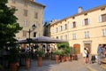 June 02 2023 - Saint-Florent, Corsica, France: people in the inner city with coloured houses