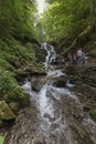 June 25, 2021 Shypit waterfall and its surroundings are a popular tourist attraction in Transcarpathia, Ukraine. Royalty Free Stock Photo