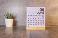 June 1st. Day 1 of month, calendar on yellow background. First summer day.