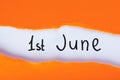 June 1st. Image of june 1 calendar on torn orange envelope background. First summer day. Happy Childrens Day