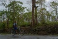 Students on bicycle in dandeli forest road at near yellapur karnataka