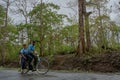 Students on bicycle in dandeli forest road at near yellapur karnataka