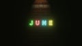 June text neon light colorful on brick wall texture . 3d illustration rendering . Neon symbol for June .