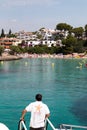 June 16th, 2017, Cala D`or, Mallorca, Spain - Starfish sea adventure boat arriving to pick up passengers