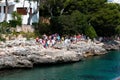 June 16th, 2017, Cala D`or, Mallorca, Spain - Starfish sea adventure boat ride arriving to pick up passengers