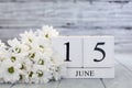 June 15th Calendar Blocks with White Daisies World Elder Abuse Awareness Day