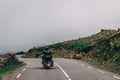 People riding in motorcycles along the scenic road to Conor Pass in county Kerry, Ireland Royalty Free Stock Photo