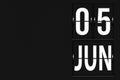 June 5th. Day 5 of month, Calendar date. Calendar in the form of a mechanical scoreboard tableau. Summer month, day of the year
