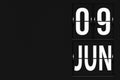 June 9th. Day 9 of month, Calendar date. Calendar in the form of a mechanical scoreboard tableau. Summer month, day of the year