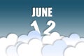 june 12th. Day 12 of month,Month name and date floating in the air on beautiful blue sky background with fluffy clouds. summer