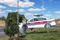 June 19, 2021, Turkey, Uchisar. Traffic control. Cardboard gendarme on the background of a fake police car. Royalty Free Stock Photo