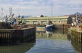 Various colourful fishing trawlers tied up in the calm waters of Kilkeel Harbour in County Down Northern Ireland