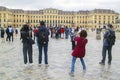 28 June 2018, Vienna, Austria: ÃÂÃÂ¡rowd of asian tourists are photographed on square in front of Schoenbrunn royal palace. Travel