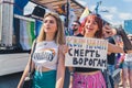 June 25, 2022 Warsaw, Poland - Happy people holding a placard with a message - Queer nation, Death to enemies, written