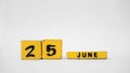 JUNE 25 Wooden calendar. Day of the Seafarer Royalty Free Stock Photo